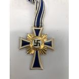 A WWII German cased gold Mother's Cross