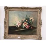 An oil on canvas depicting a floral still life, signed Ellenshaw,
