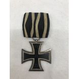 A WWI Iron Cross and ribbon