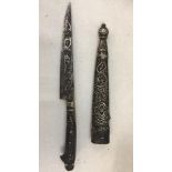 An Eastern dagger with silver inlay and scabbard