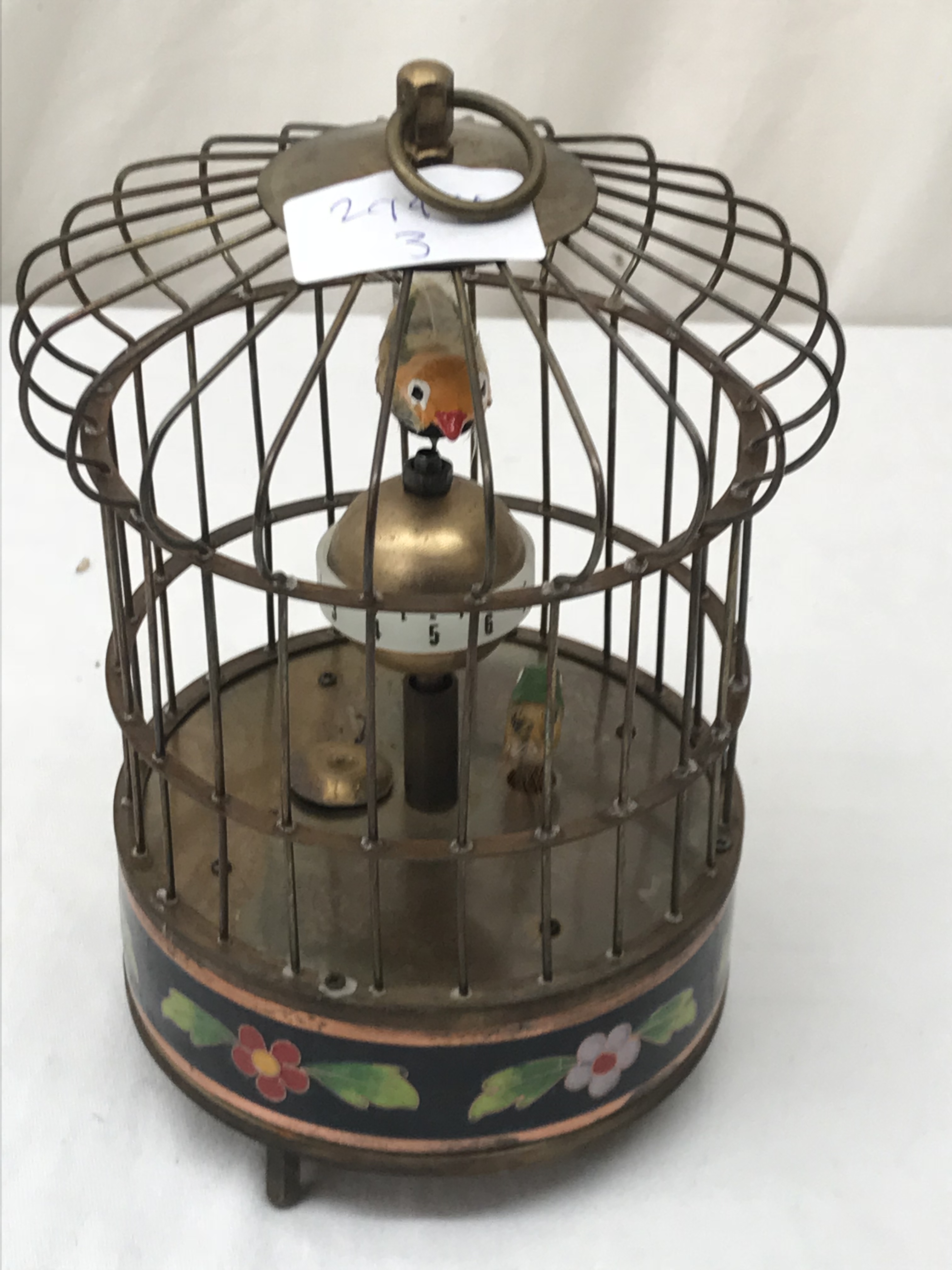 A birdcage automaton clock