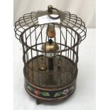 A birdcage automaton clock