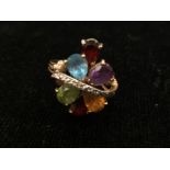 A 9ct amethyst set abstract dress ring