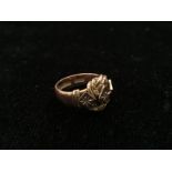 A 9ct lovers knot ring