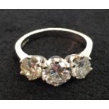 An 18ct large diamond trilogy ring