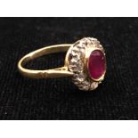 An 18ct ruby and diamond dress ring