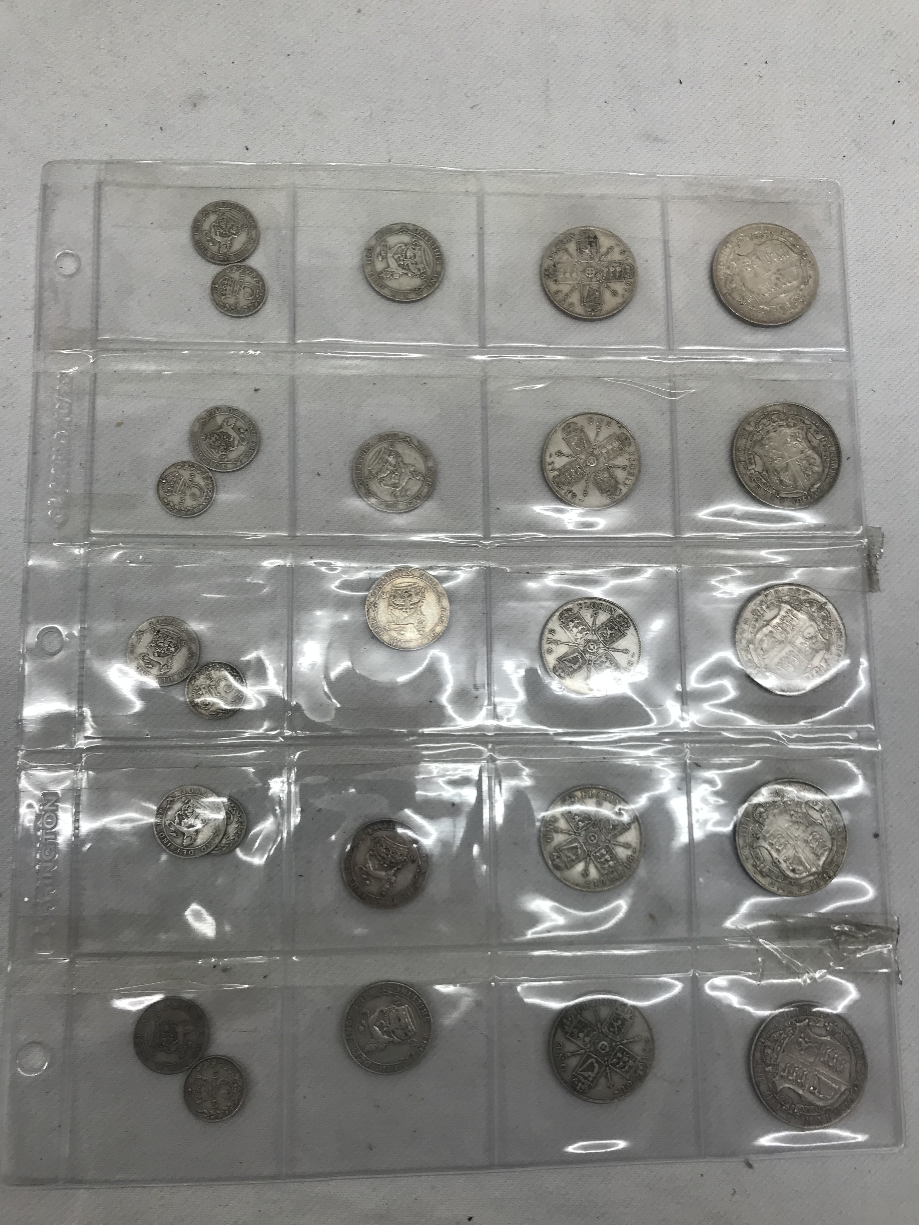 Five sets of 1918 silver coins: 3d, 6d, shilling,