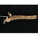 A 9ct link charm bracelet