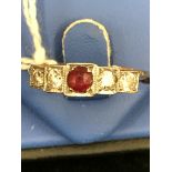 An Art Deco diamond and ruby dress ring