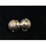 A pair of 9ct coffee bean clip on earrings