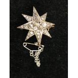 A Victorian diamond star brooch