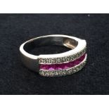 An 18ct diamond and ruby dress ring