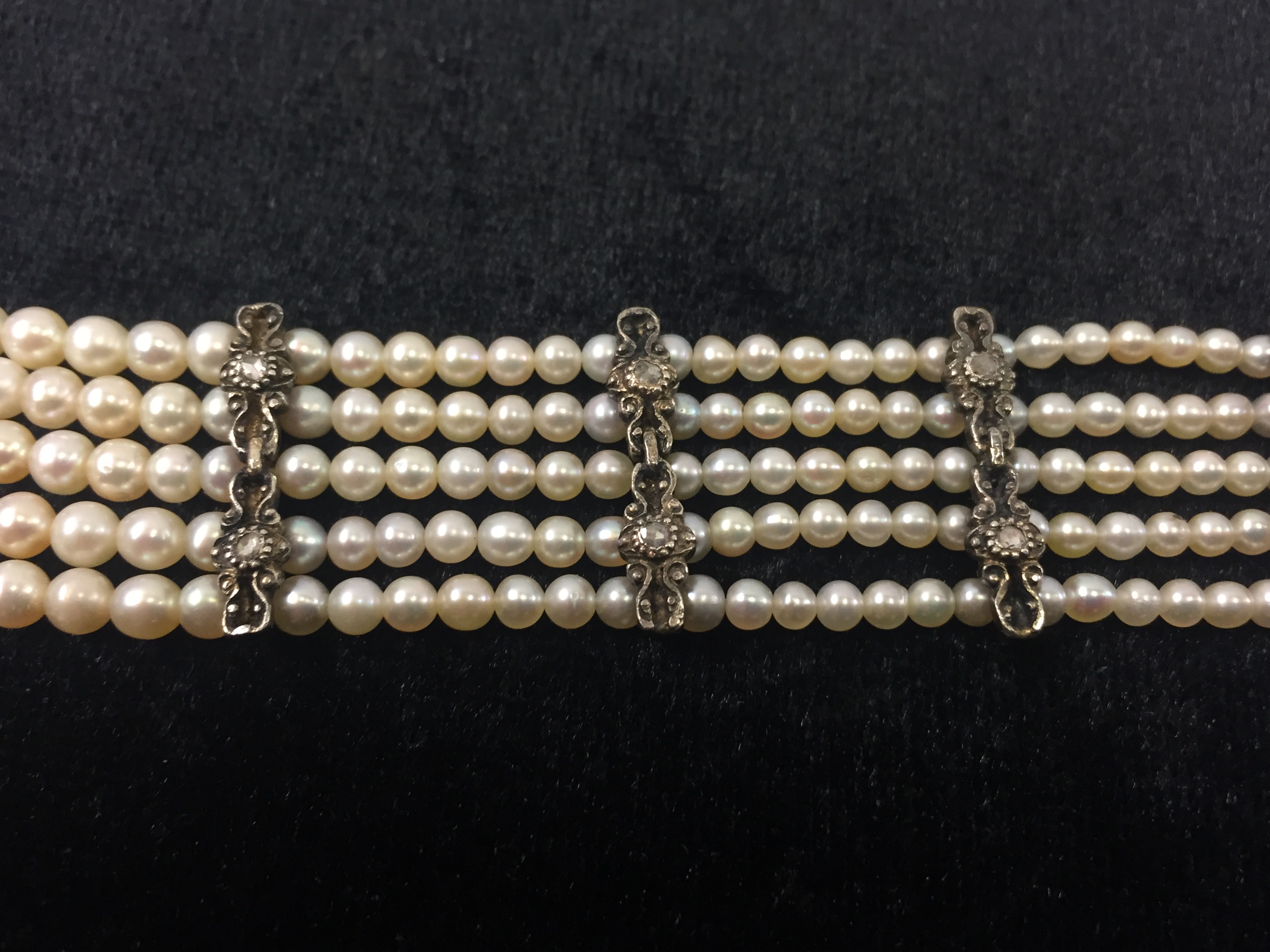 A 19th Century Continental Natural Pearl and Diamond Bracelet: The unhallmarked clasp set with rose - Image 7 of 8