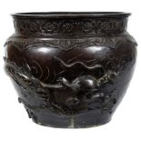 Two Bronze Meiji Period Bowls: The smaller piece depicting a dragon in high relief breathing fire,