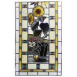 An Arts & Crafts Period Stained Glass Window: Finely inset with naturalistic design featuring