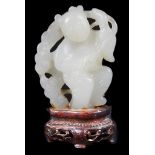 A Chinese Jade Carving: Possibly 18th/19th Century, a light celadon green tone with waxy lustre.
