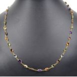 A 14ct Mixed Stone Necklace: Set along the length of the necklace, in single row, set with amethyst,