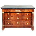 A Black Marble-Topped Empire Chest of Drawers: Concealed drawer to top over three drawers with gilt