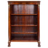 An Empire Period Open Bookcase: Mahogany architectural form bookcase with three shelves ormolu