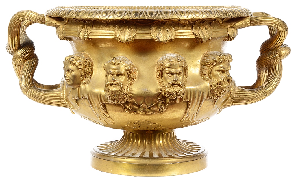 A French Gilt Bronze Model of the Warwick Vase: 19th century, with twisted handles,