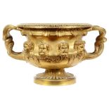 A French Gilt Bronze Model of the Warwick Vase: 19th century, with twisted handles,