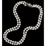 A 19th Century Continental Pearl Necklace: The double strand of six millimetre pearls beautifully