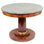 A Large Circular Empire Period Marble-Topped Table: Black marble topped table with ormolu fitted