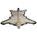 A Bengal Tiger Taxidermy Rug: Bearing a worn label for Van Ingen of Mysore India,