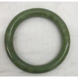 An 18th/19th century jade carved bangle