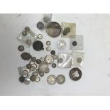 A quantity of pre-1920 silver coins/medallions