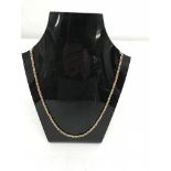 A 9ct tri-colour gold rope necklace