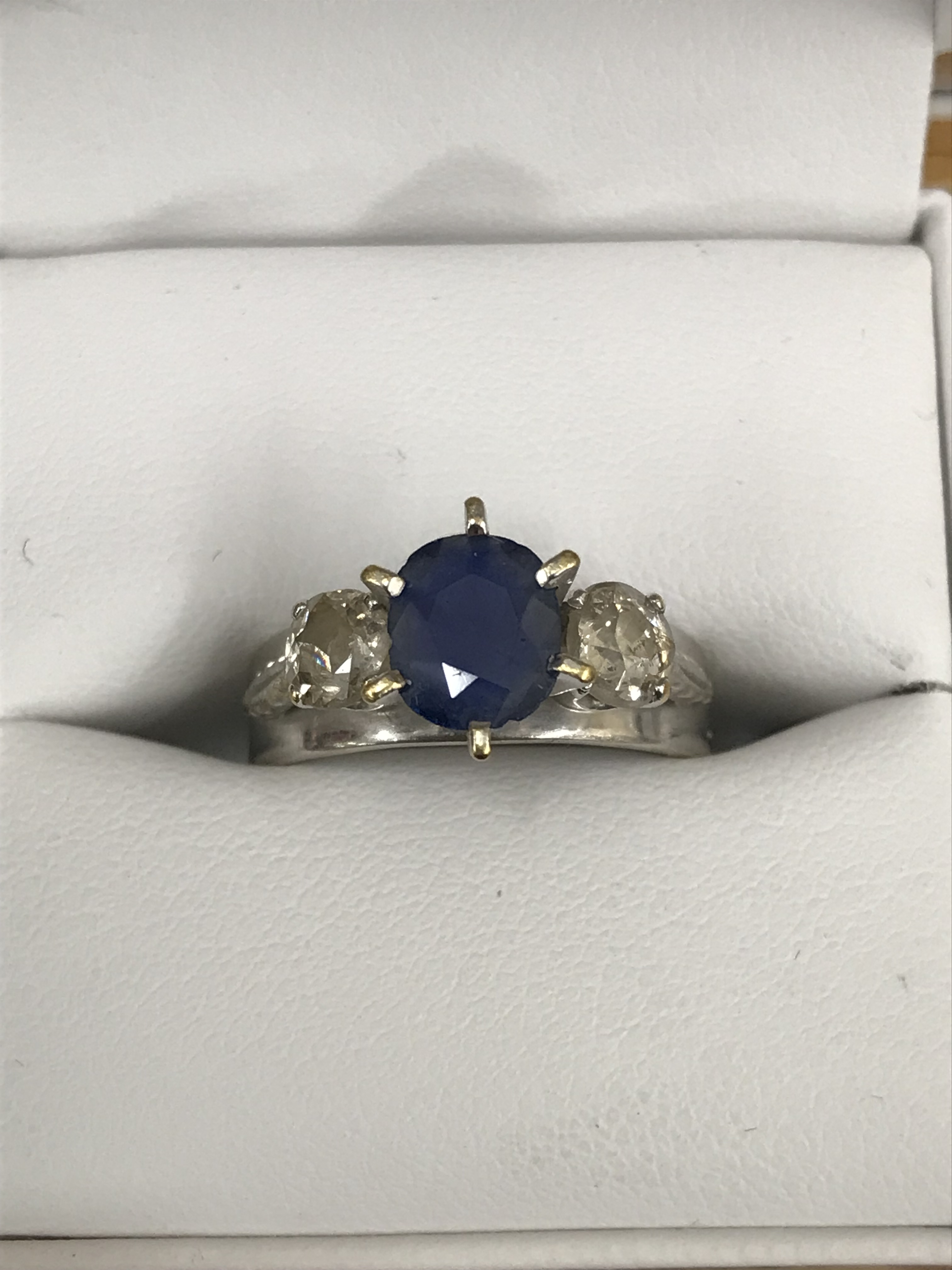 A 9ct diamond and sapphire ring