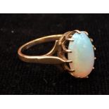 An 18ct gold and opal ring