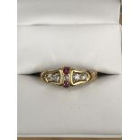 An 18ct ruby and diamond ring