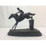 E Loisauy: a bronze of a jumping horse