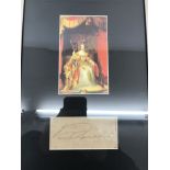 A framed and glazed signature of Queen Victoria,