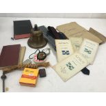 An MV Australind 1978 bell and original photographs; together with ties, a War Department watch,