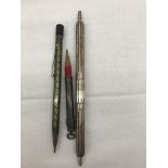 A large silver double-ending pencil,