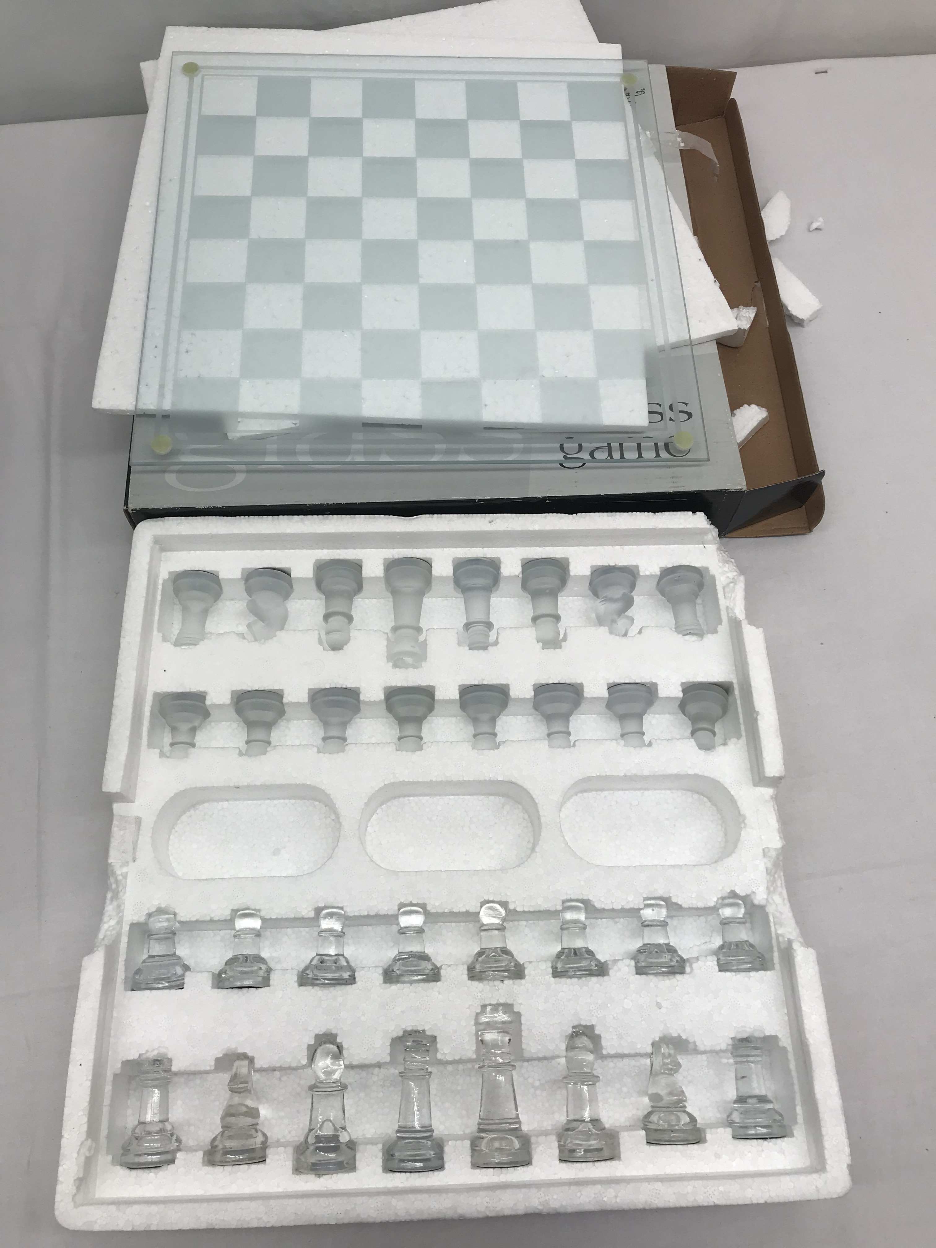 A boxed glass chess set