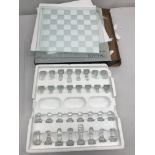 A boxed glass chess set