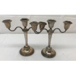 A pair of HM silver candelabra