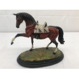 A resin statue of a horse