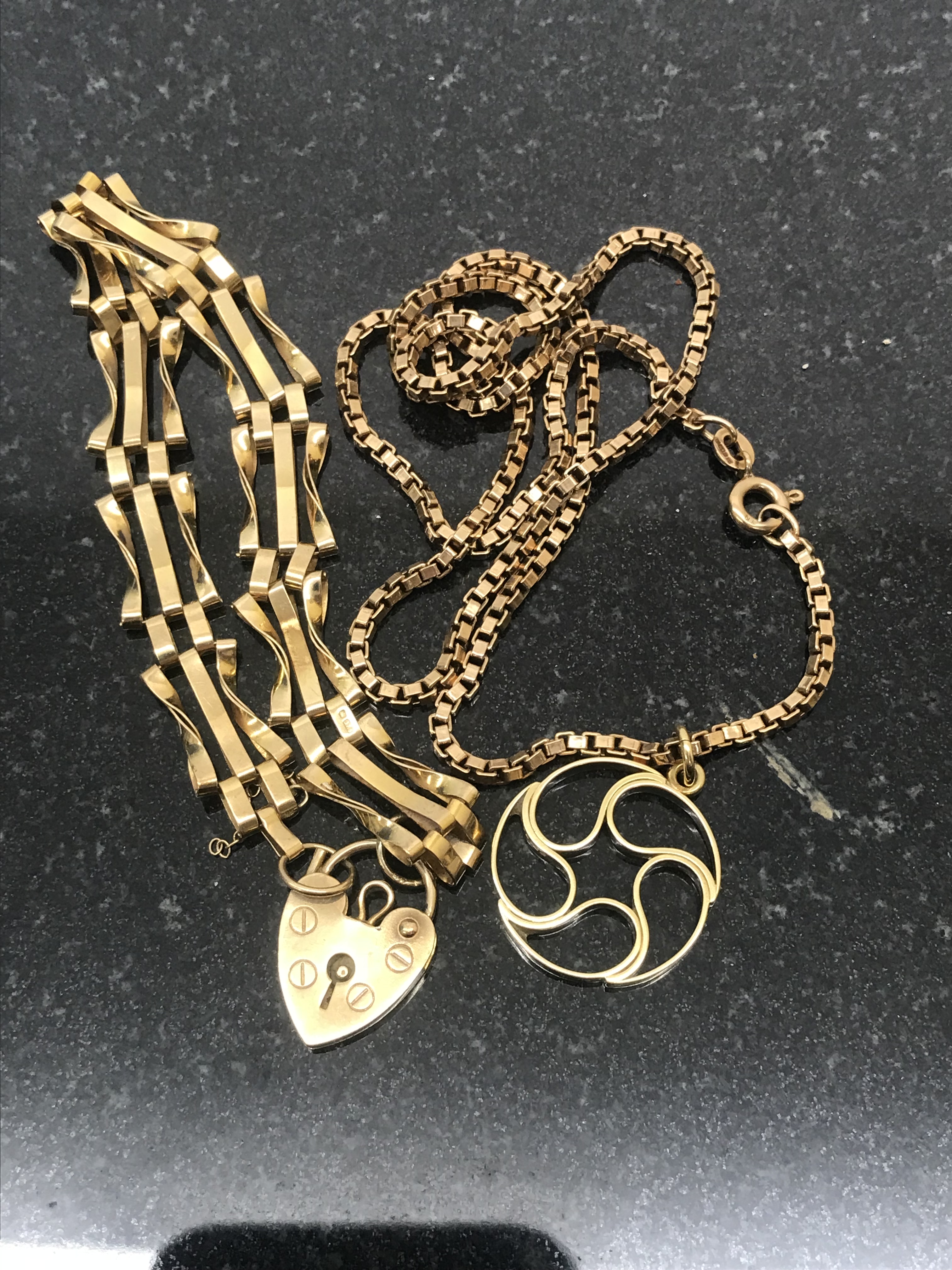 A gold bracelet,