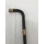 An Edwardian 18ct gold-plated malacca walking stick presented to M K Johnson, Dec 1,