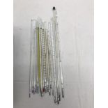 A collection of clinical thermometers: 6" to 1 ft approx