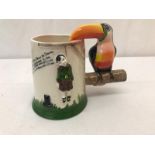 A Carltonware hangman jug with Toucan handle