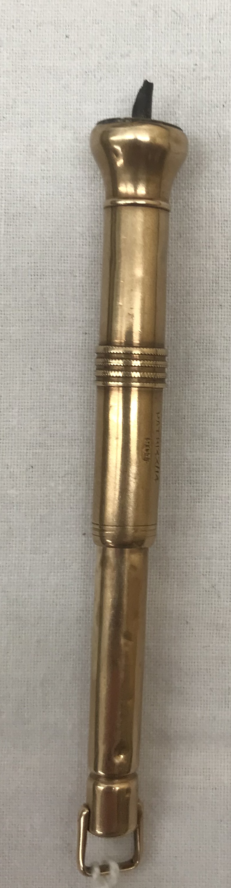 A Victorian 9ct gold cigar piercer by E Barker