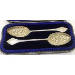 A pair-cased HM silver berry spoon