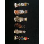 Four 9ct gold Halcyon Days perfume bottles in the form of cats;
