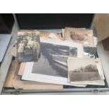 A suitcase of photographs include topographical sport, transport etc.